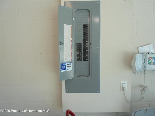 utility room featuring electric panel