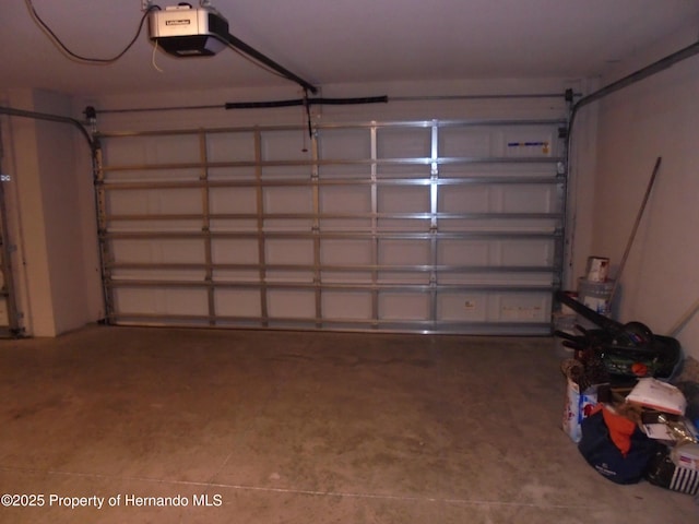 garage featuring a garage door opener