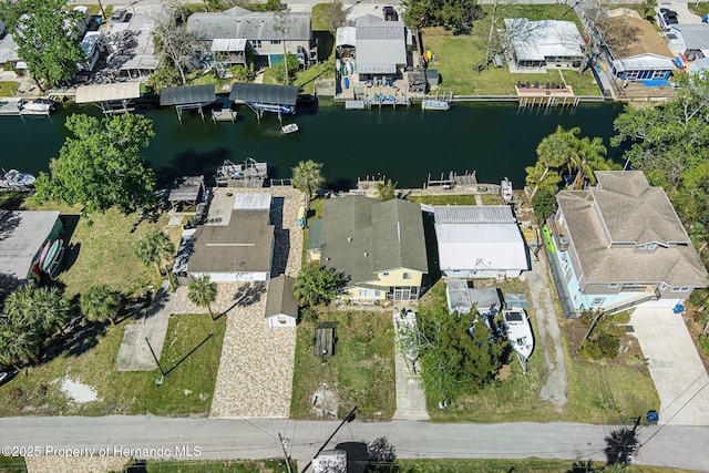 aerial view featuring a water view and a residential view