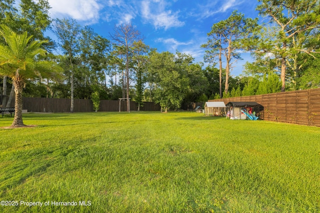 view of yard with fence