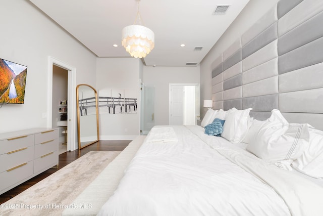 bedroom with baseboards, visible vents, dark wood-style flooring, and recessed lighting