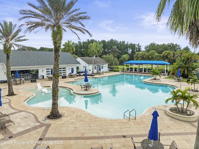 pool featuring a patio area