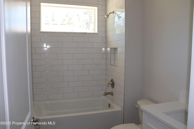 full bath with shower / bath combination, toilet, and vanity