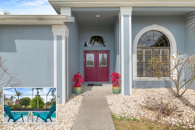 property entrance featuring stucco siding