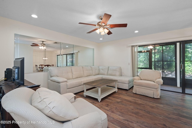 living area featuring ceiling fan, wood finished floors, and recessed lighting