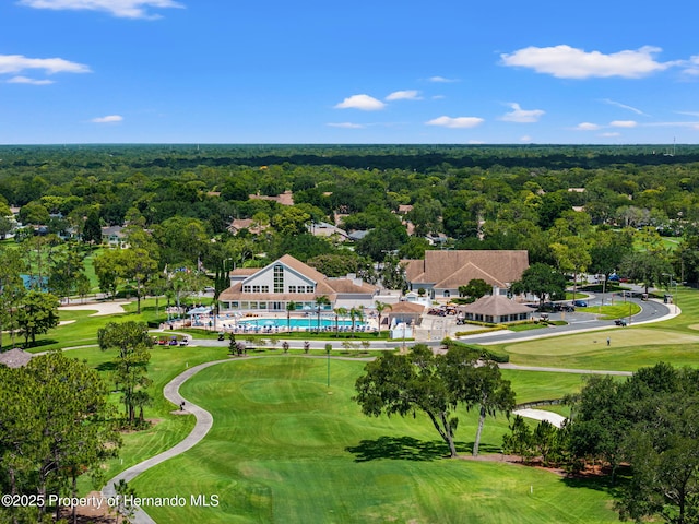 aerial view featuring a wooded view