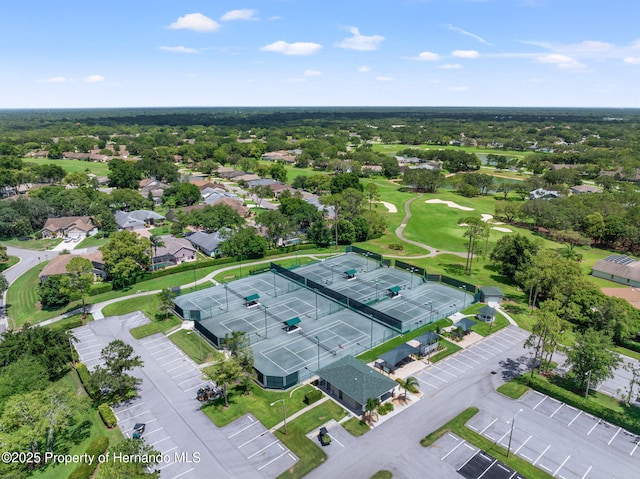 birds eye view of property with golf course view