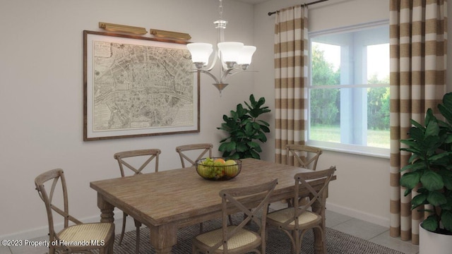 dining room with a notable chandelier, tile patterned flooring, baseboards, and a wealth of natural light