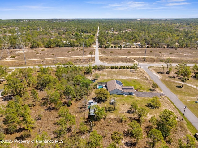 13415 Ester Dr, Brooksville, FL 34613 - aerial view featuring a forest view