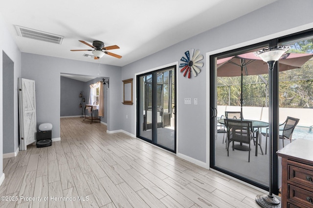 13415 Ester Dr, Brooksville, FL 34613 - interior space featuring a ceiling fan and visible vents