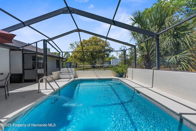 13415 Ester Dr, Brooksville, FL 34613 - outdoor pool with a lanai and a patio