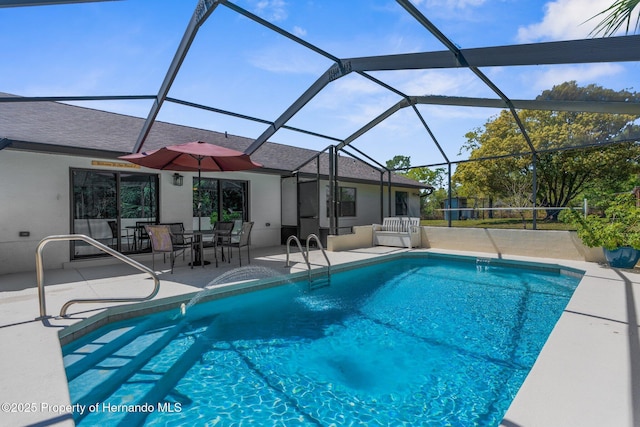 13415 Ester Dr, Brooksville, FL 34613 - pool with a patio area and glass enclosure