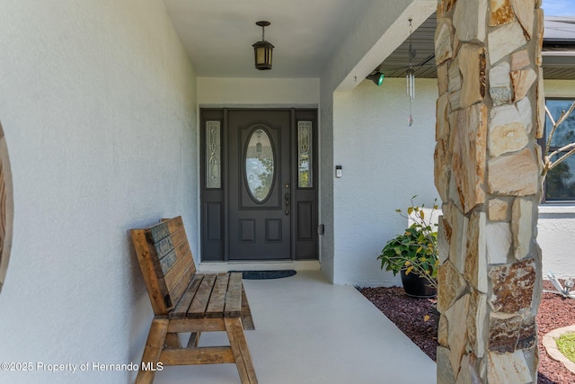 13415 Ester Dr, Brooksville, FL 34613 - entrance to property with stucco siding