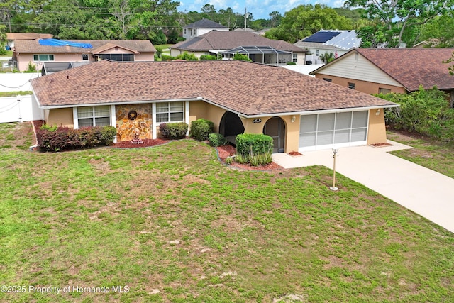2013 Meredith Dr, Spring Hill, FL 34608 - single story home with concrete driveway, an attached garage, stucco siding, and a shingled roof