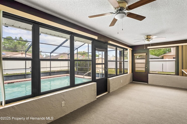 2013 Meredith Dr, Spring Hill, FL 34608 - unfurnished sunroom with a ceiling fan and plenty of natural light