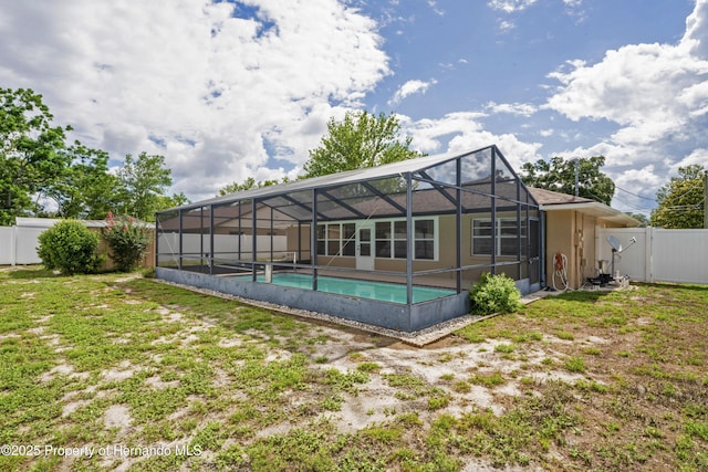 2013 Meredith Dr, Spring Hill, FL 34608 - back of property with glass enclosure