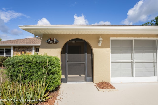 2013 Meredith Dr, Spring Hill, FL 34608 - property entrance featuring stucco siding