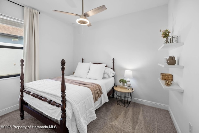 bedroom featuring ceiling fan, baseboards, and carpet floors