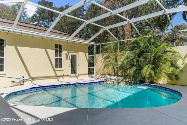 pool featuring a patio and a lanai