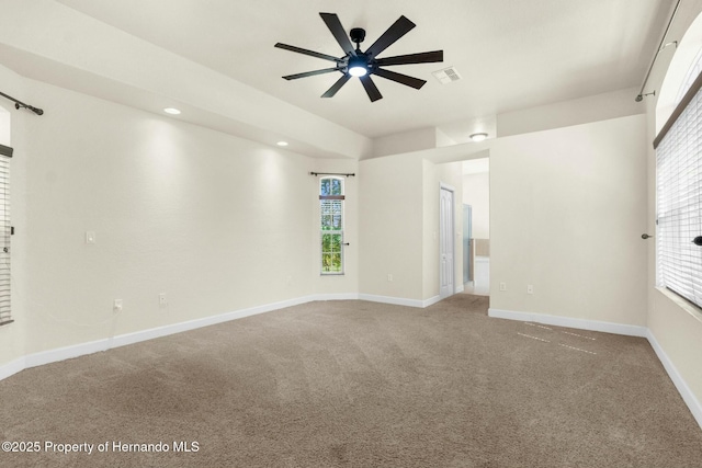 spare room with carpet, recessed lighting, visible vents, ceiling fan, and baseboards