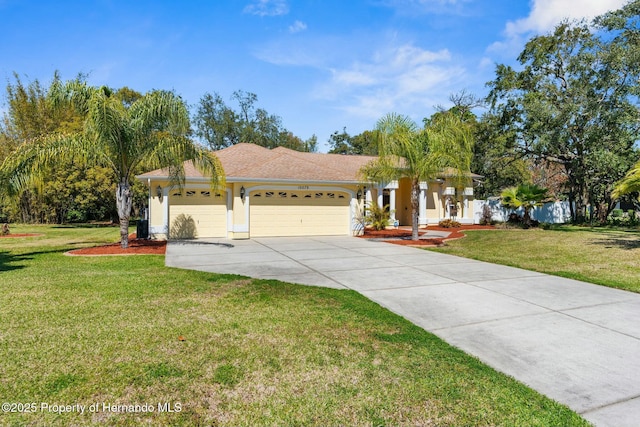 ranch-style house featuring roof with shingles, stucco siding, concrete driveway, an attached garage, and a front yard