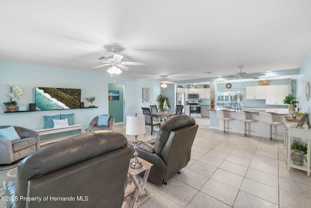 living room featuring light tile patterned floors