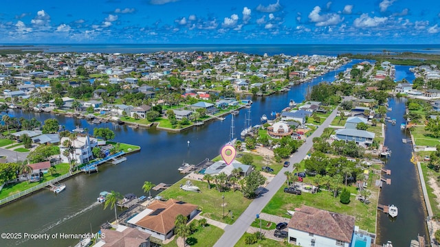 aerial view with a water view and a residential view