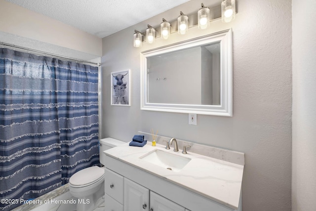 bathroom featuring a textured ceiling, a textured wall, curtained shower, toilet, and vanity