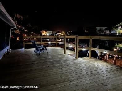 view of deck at night