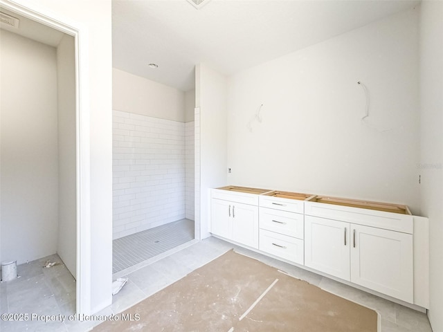 bathroom with a stall shower