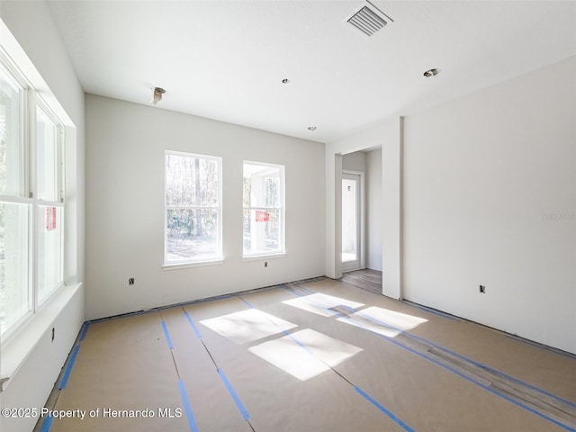 spare room with visible vents