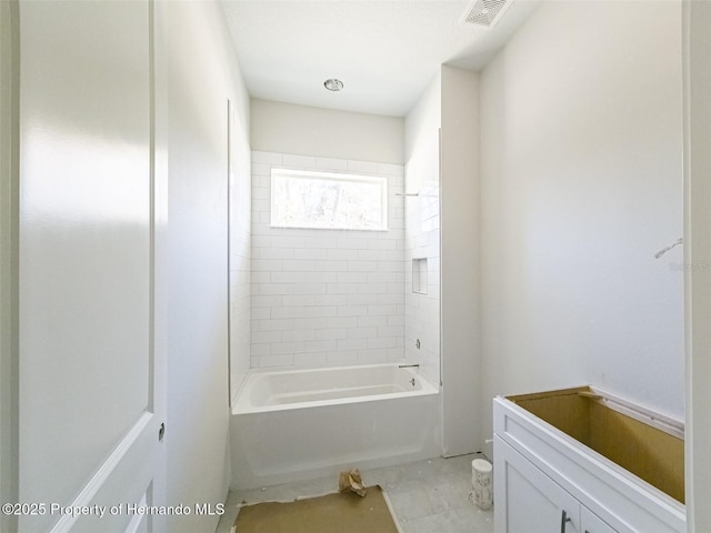 bathroom with shower / bath combination and visible vents