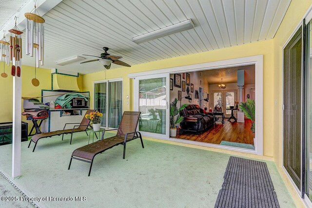 view of patio / terrace with a ceiling fan and french doors