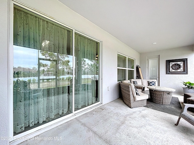 balcony with a patio area and outdoor lounge area