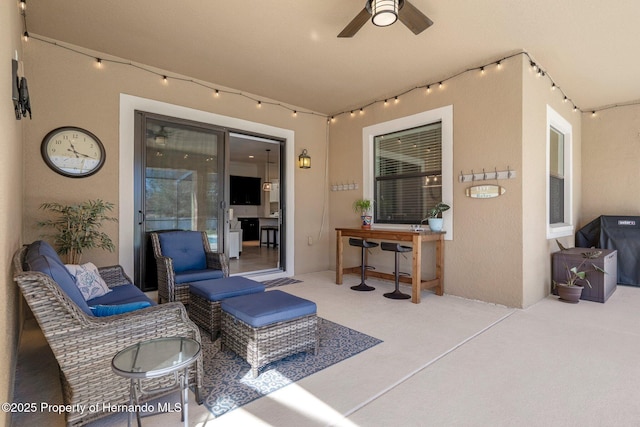 view of patio / terrace featuring a ceiling fan