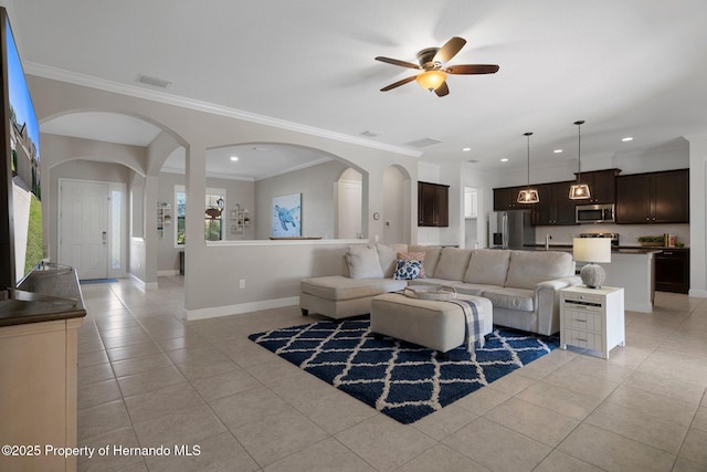 living room with light tile patterned flooring, recessed lighting, visible vents, baseboards, and ornamental molding