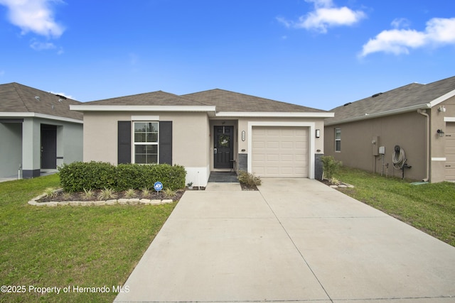 single story home with a front lawn, driveway, an attached garage, and stucco siding