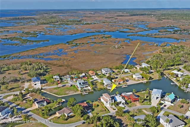 aerial view with a water view and a residential view