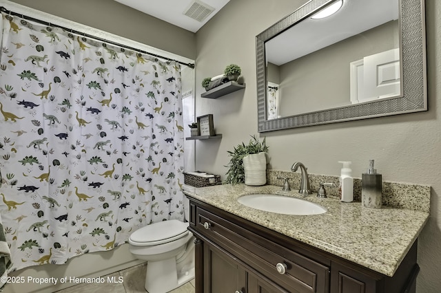 full bathroom with visible vents, toilet, shower / bath combo with shower curtain, vanity, and tile patterned flooring