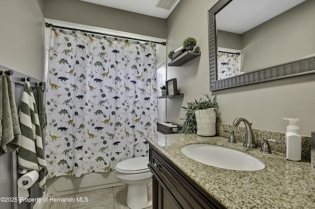 bathroom featuring tile patterned flooring, toilet, visible vents, vanity, and shower / bath combination with curtain