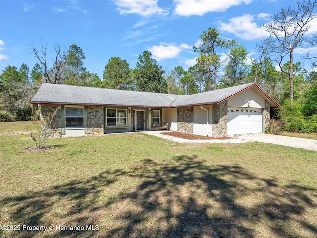 single story home with a front yard, stone siding, driveway, and an attached garage