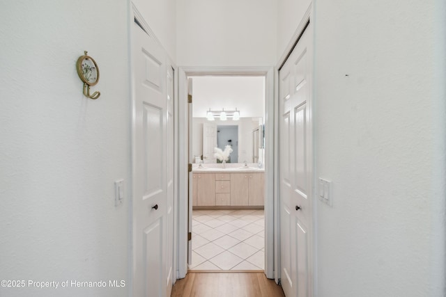 hallway featuring light wood-type flooring