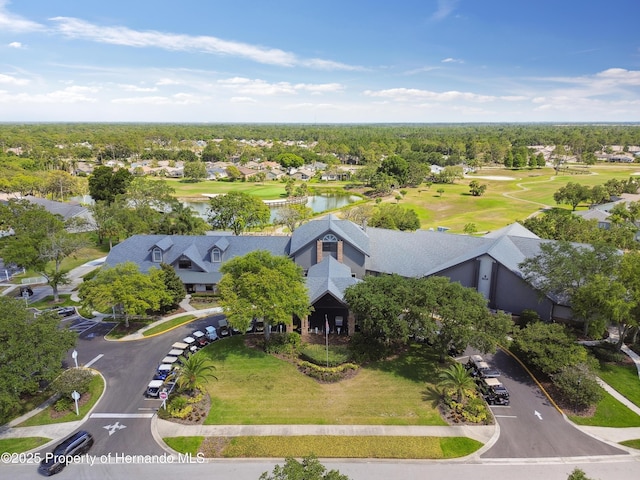 bird's eye view with a water view and golf course view