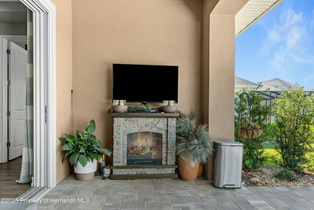 view of patio / terrace with a fireplace