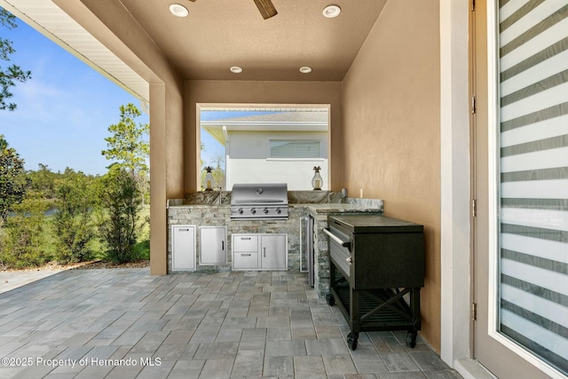 view of patio with area for grilling