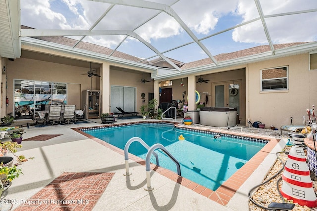 pool featuring a ceiling fan, a lanai, and a patio