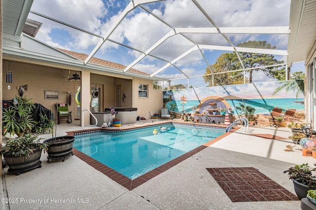 pool with a lanai and a patio