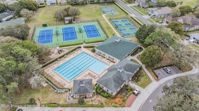 birds eye view of property with a residential view