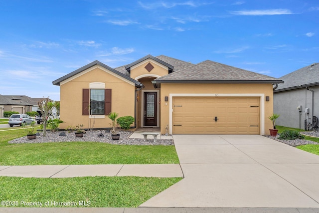 single story home with stucco siding, a shingled roof, an attached garage, a front yard, and driveway