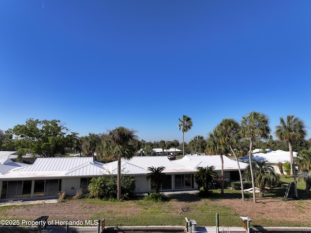 view of front of house with metal roof